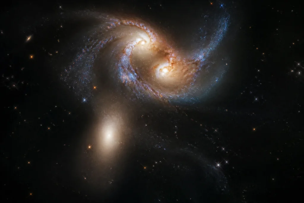 Galaxies lointaines brillant lors de leur fusion